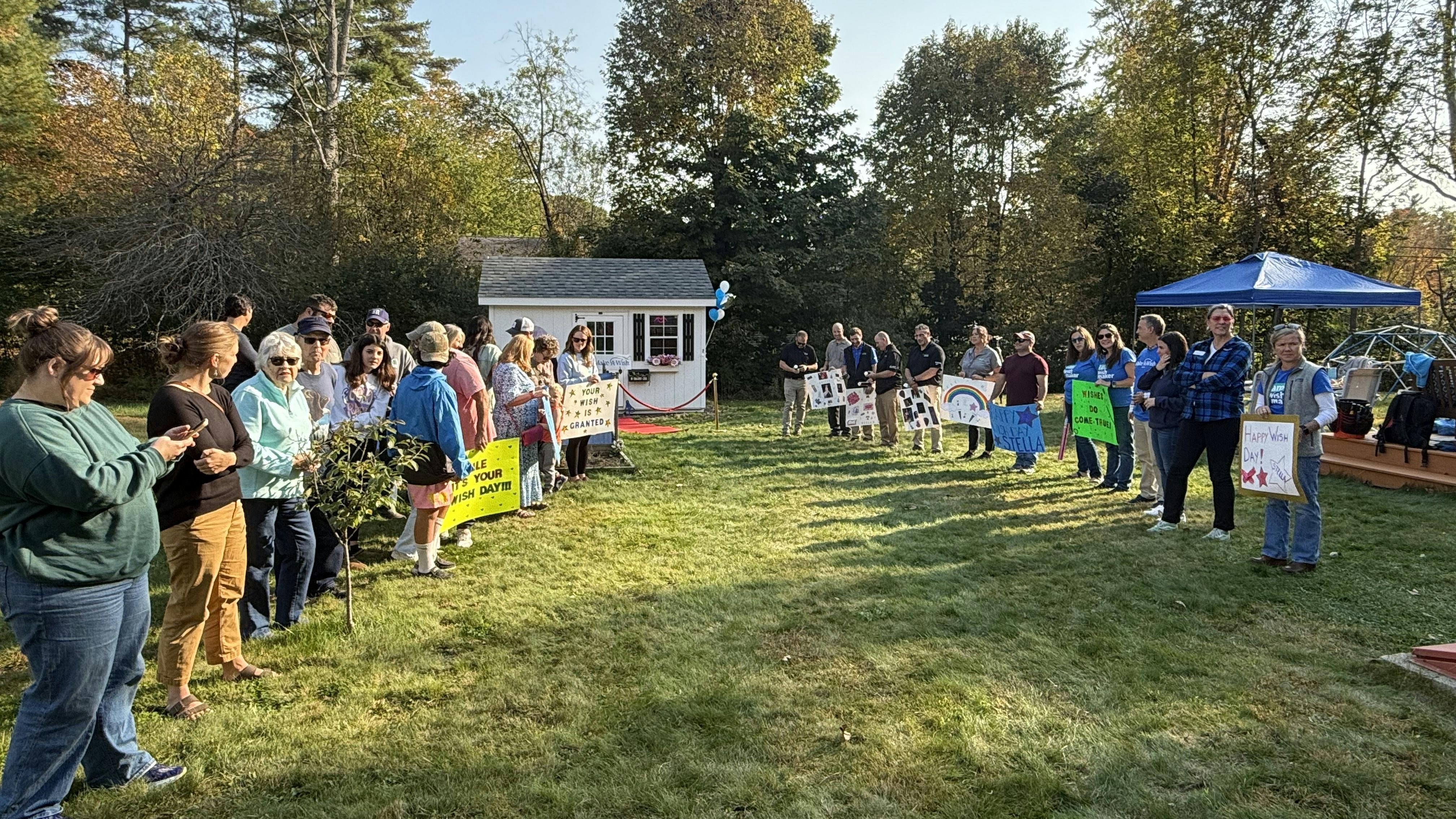 Stella's Fan Club, which included members of Make-A-Wish Maine, Service Experts, and 50 of her family and friends lined the driveway to celebrate Stella&rsquo;s arrival home to see her shed for the first time.