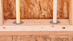 Insulating pipe clamps. Insulating pipe clamps.