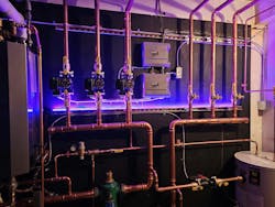 The panel is outfitted with color-coded LED lights that signal when the system calls for heat (red) or domestic water (blue). The panel is outfitted with color-coded LED lights that signal when the system calls for heat (red) or domestic water (blue).