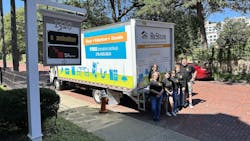 A group of tool drive volunteers with a rental truck full of donations. A group of tool drive volunteers with a rental truck full of donations.