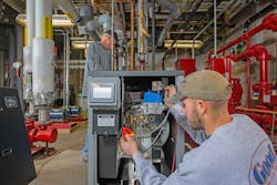 Good’s Project Manager, Don Landis (L), and Lead Mechanic, Tom Grasse in the boiler room at Our Lady of Guadalupe. Good’s Project Manager, Don Landis (L), and Lead Mechanic, Tom Grasse in the boiler room at Our Lady of Guadalupe.