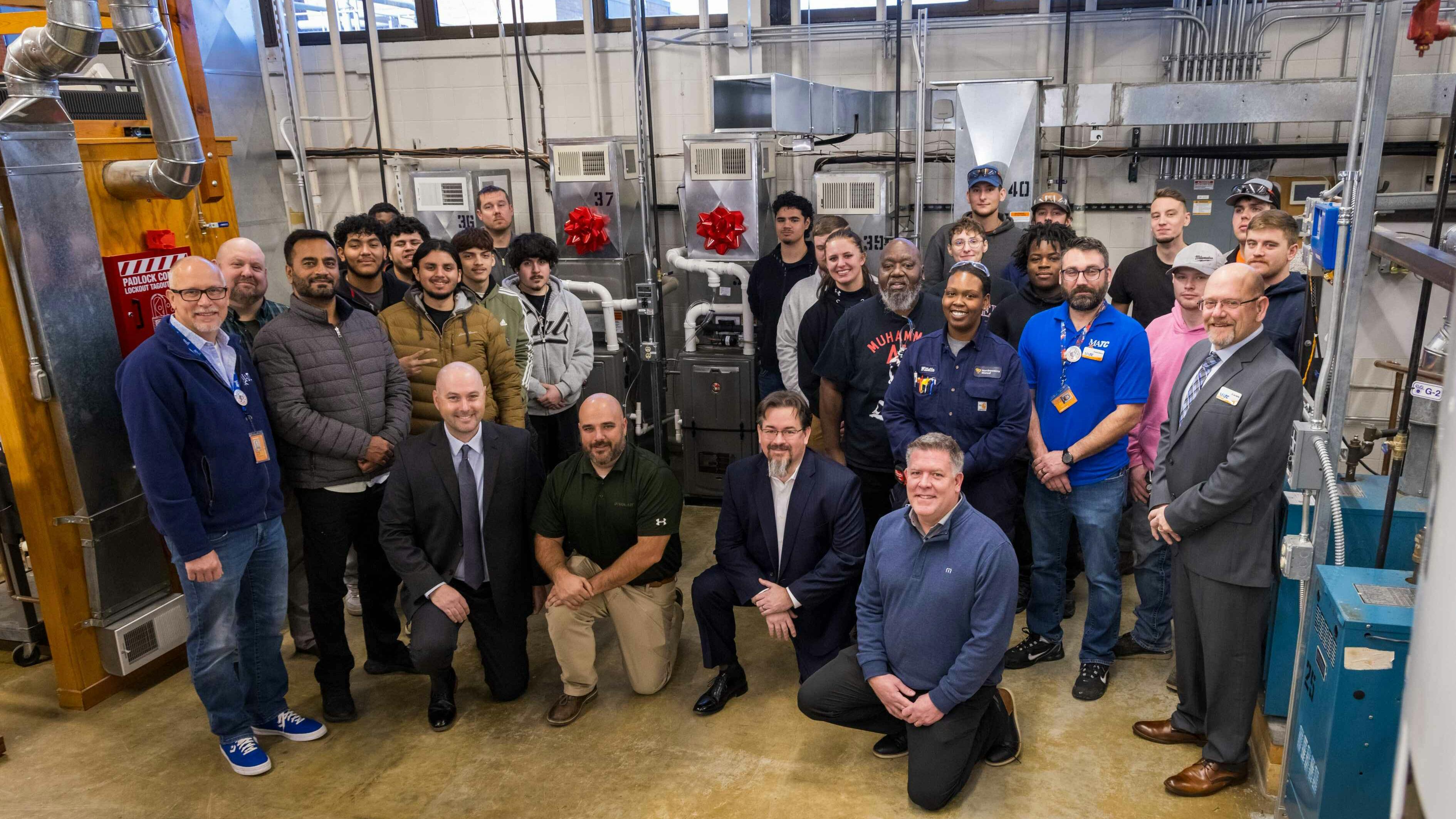 A group photo of the event at the Milwaukee Area Technical College (MATC).