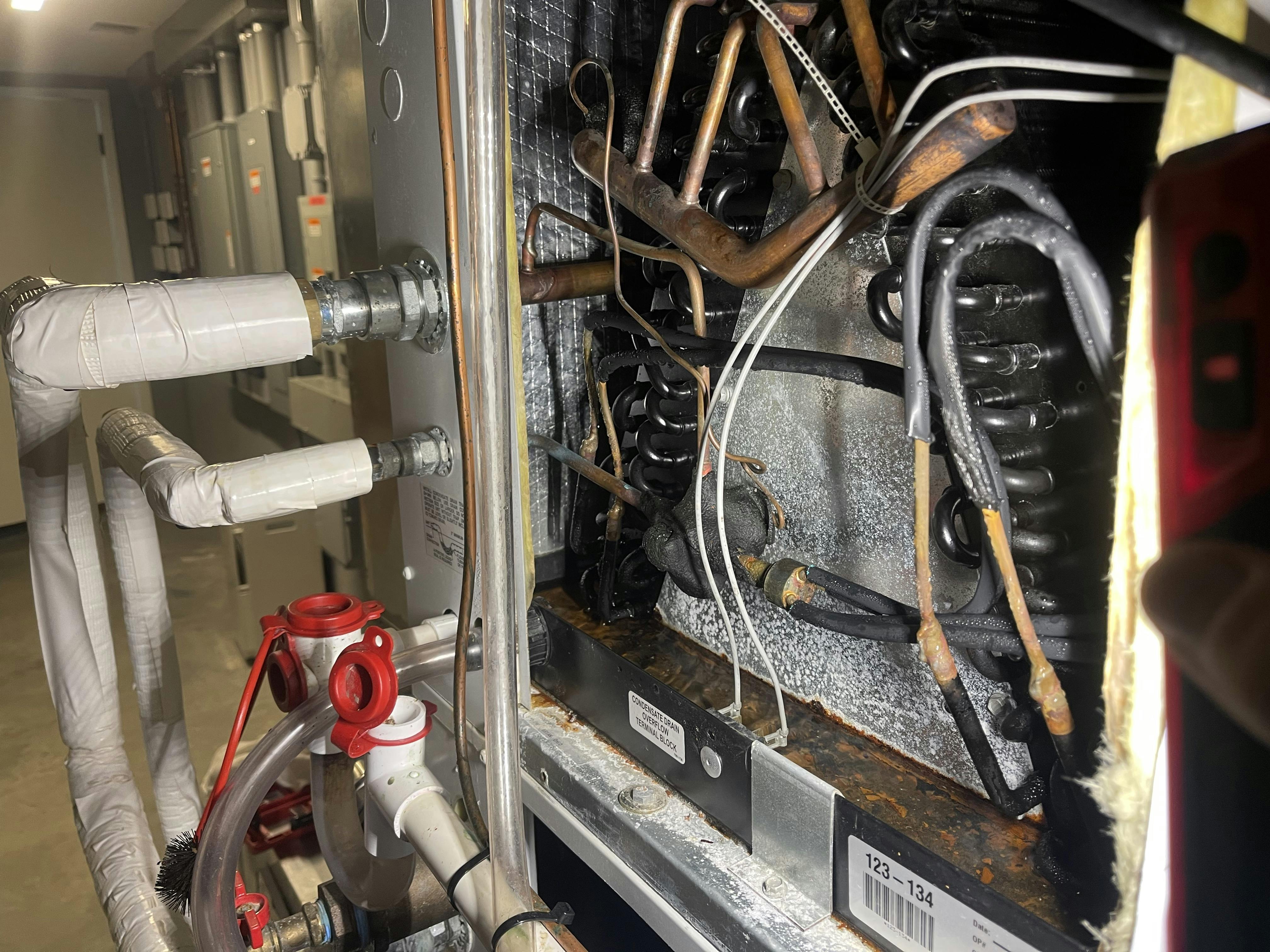Leaking refrigerant connections between sections.