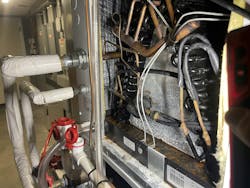 Leaking refrigerant connections between sections. Leaking refrigerant connections between sections.