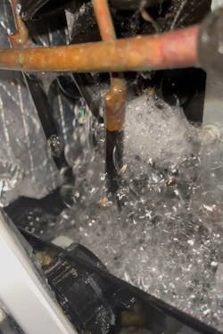 A leaking coil causing the condensate sensor to trip. A leaking coil causing the condensate sensor to trip.