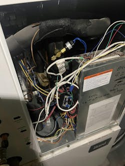 A new refrigerant pressure switch connected to a tee fitting. A new refrigerant pressure switch connected to a tee fitting.