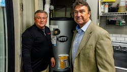 Walter Terry, right, who owns the restaurant with his wife, Jennifer, confers with Ansley Houston, Vice President of Sales for Ariston USA. Walter Terry, right, who owns the restaurant with his wife, Jennifer, confers with Ansley Houston, Vice President of Sales for Ariston USA.