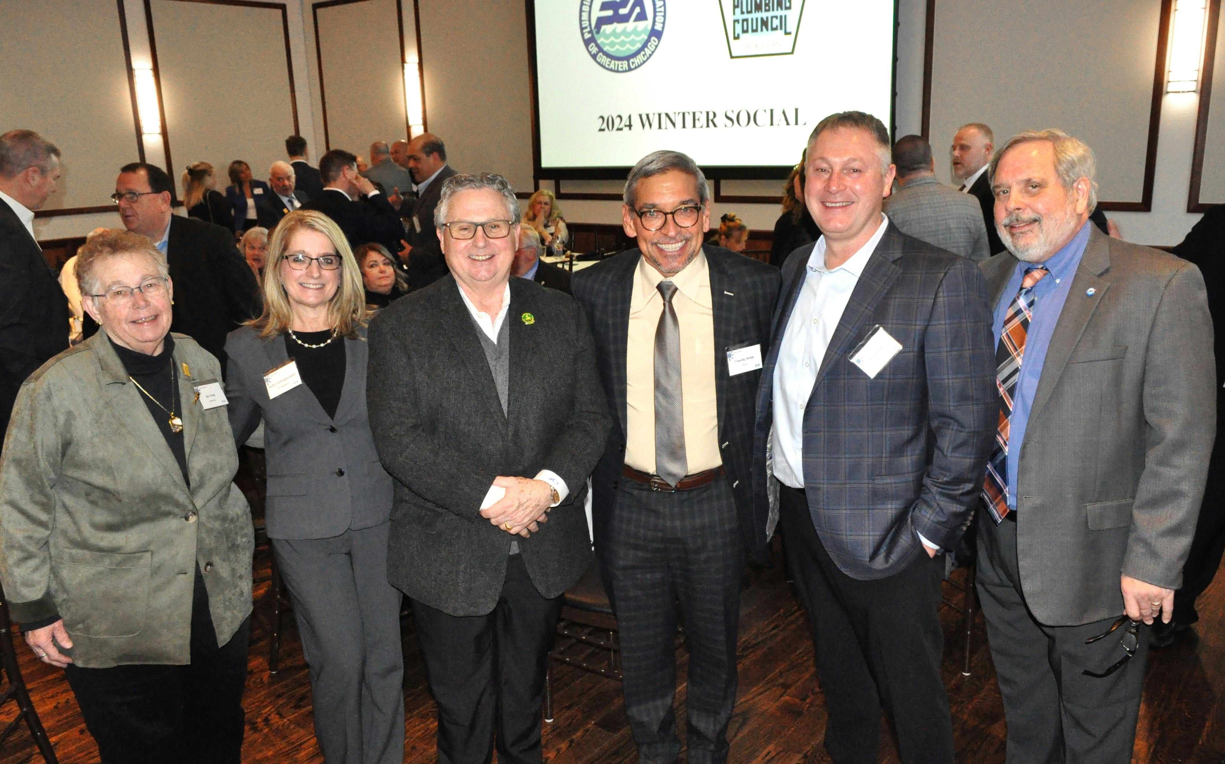 At the PCA Winter Social. From left: Bev Potts (Executive Director, IL PHCC); Kelly Castrogiovanni (PCA President & Owner/President – TPC); James F. Coyne (Business Manager, Plumbers’ Local 130 UA); Tim Brink (CEO, MCAA); Brian Rich (GA Rich & Sons; and UA Intl. Training Fund; and S.J. Peters (Executive Director – PCA & Plumbing Council).