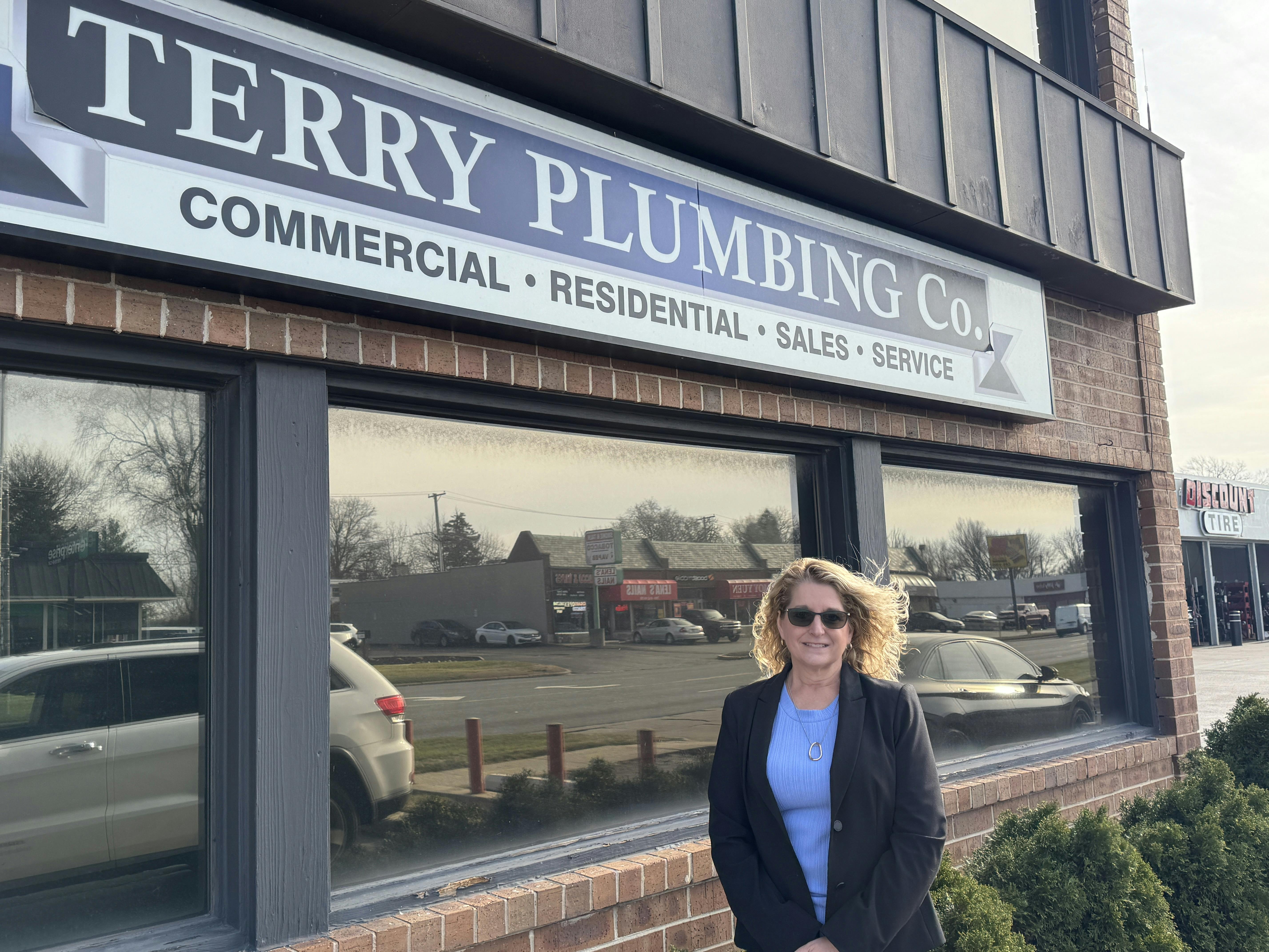 Kelly Castrogiovanni outside the Terry Plumbing Co. HQ.