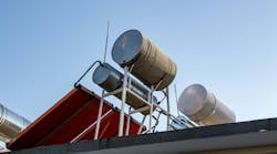 A rooftop-installed solar water heating system. A rooftop-installed solar water heating system.
