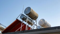A rooftop-installed solar water heating system. A rooftop-installed solar water heating system.