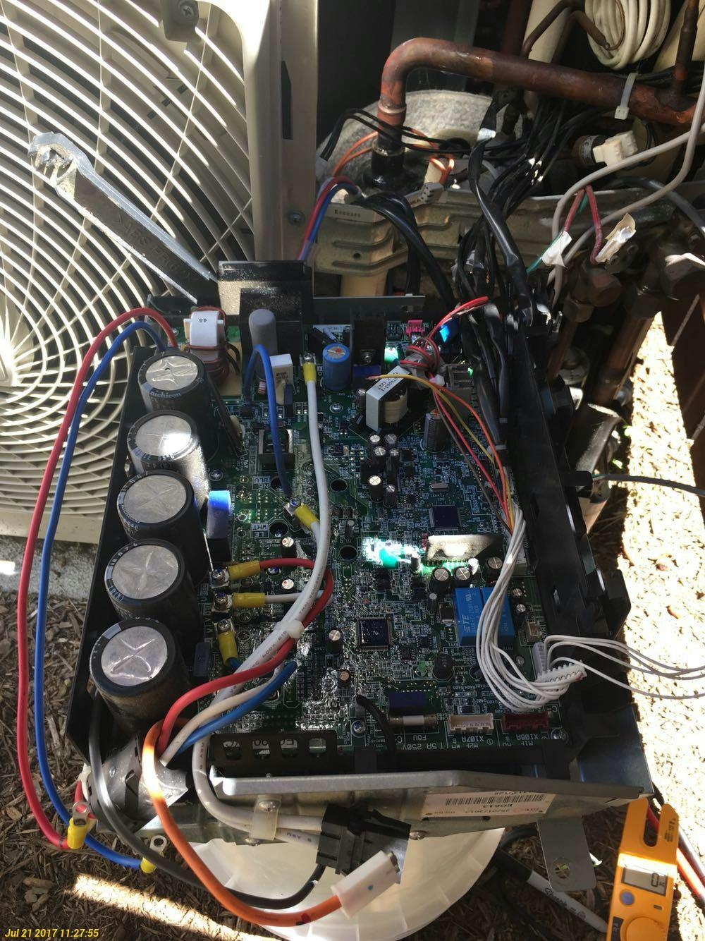 Dismantling the heat pump to replace main board.