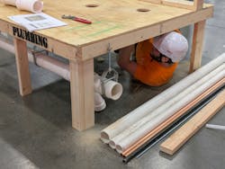 This year the plumbing competition consisted of constructing a mechanical room with a water heater set-up and a wash sink. This year the plumbing competition consisted of constructing a mechanical room with a water heater set-up and a wash sink.