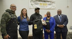 Bracey, along with students and school administrators. Bracey, along with students and school administrators.