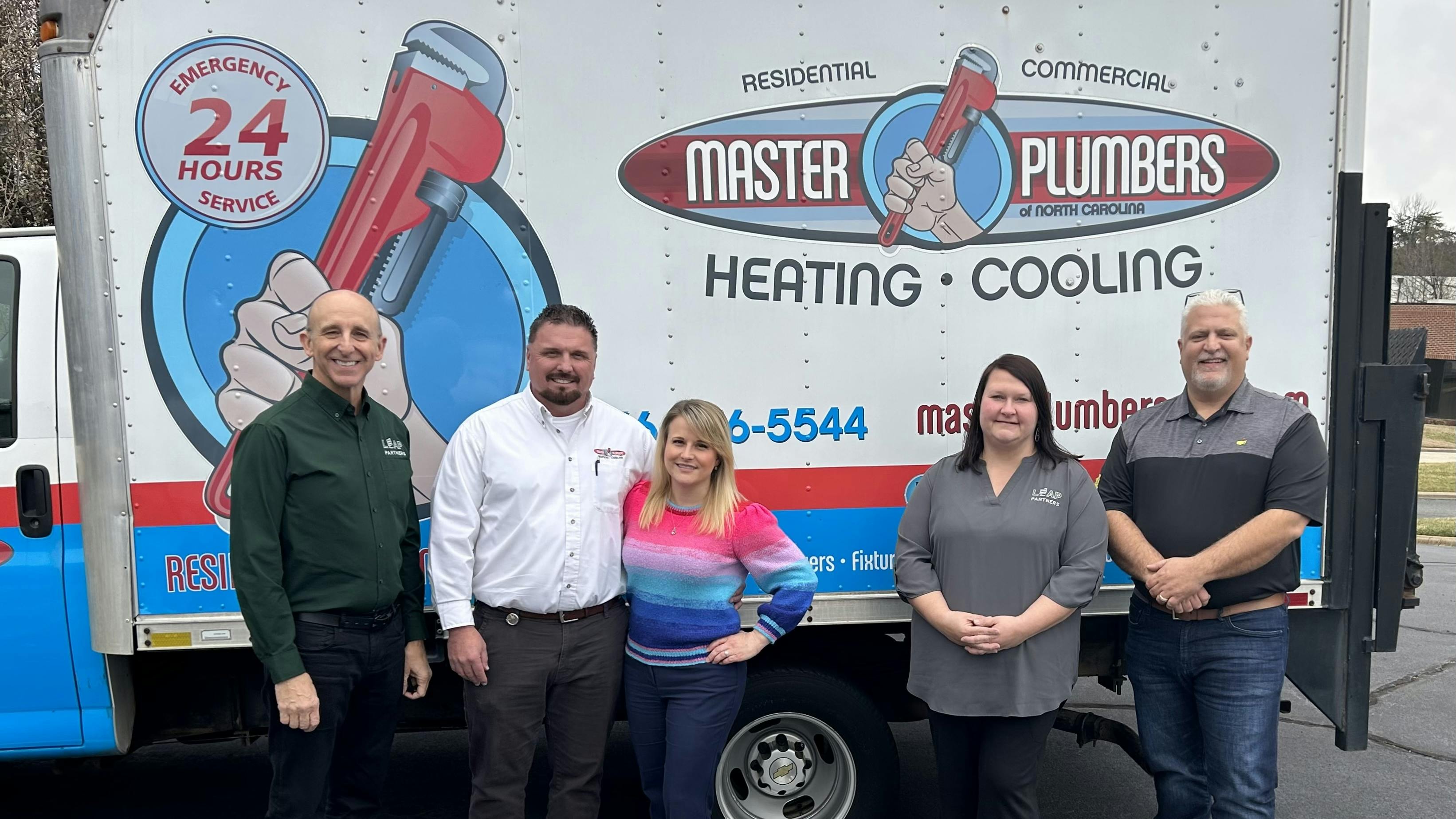 (Left to right) CEO of Leap Partners, John Cerasuolo; former owner, Lee Amos, and his wife, Bethany Amos; Leap Partners VP of HR, Safety and Risk, Kristi Toth; and Leap Partners VP of Regional Operations, Ben Scott.