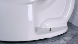 An offset toilet flange. An offset toilet flange.