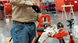 A competitor in the Pipe Joining competition at the 2025 National Craft Championships. A competitor in the Pipe Joining competition at the 2025 National Craft Championships.