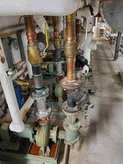 Heating loop pumps with no check valves—original installation. Heating loop pumps with no check valves—original installation.