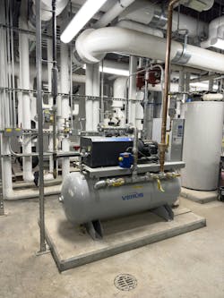 Domestic PRV station and compressor in the second-floor mechanical room of the addition space. Domestic PRV station and compressor in the second-floor mechanical room of the addition space.