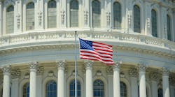 National Flag in front of United State Capitol Building in Washington, District of Columbia, USA. National Flag in front of United State Capitol Building in Washington, District of Columbia, USA.