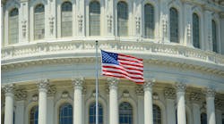National Flag in front of United State Capitol Building in Washington, District of Columbia, USA. National Flag in front of United State Capitol Building in Washington, District of Columbia, USA.