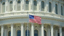 National Flag in front of United State Capitol Building in Washington, District of Columbia, USA. National Flag in front of United State Capitol Building in Washington, District of Columbia, USA.