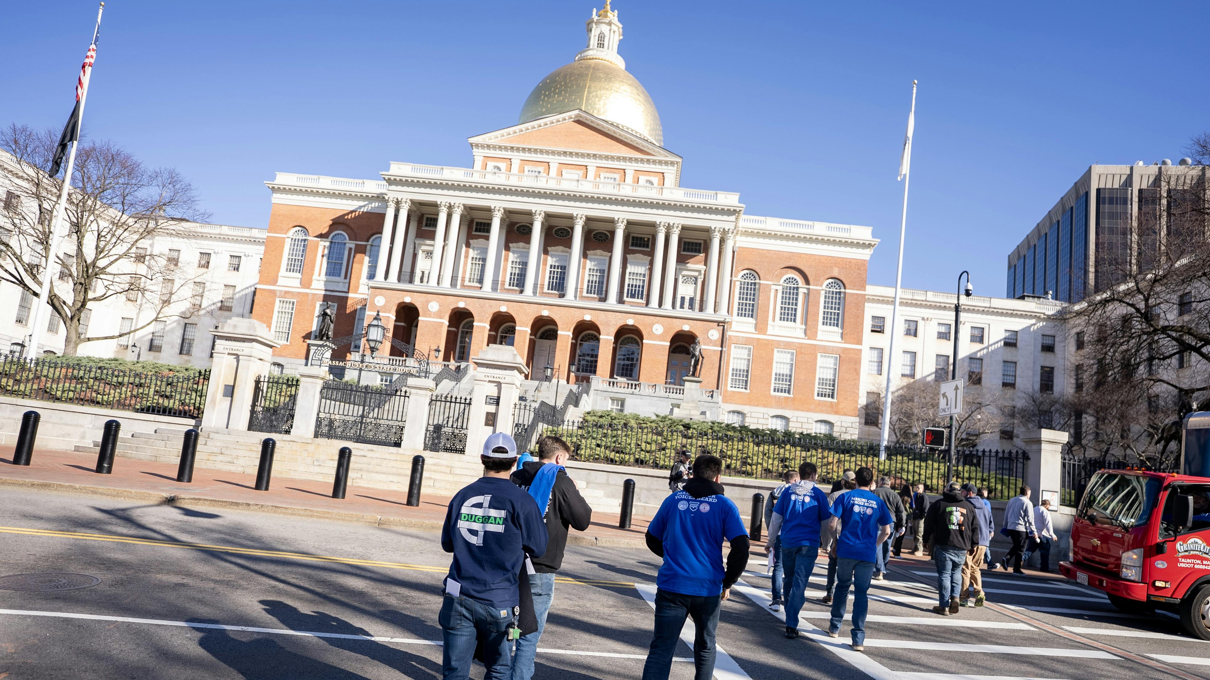 Attendees at the Massachusetts State Capitol building in Boston.