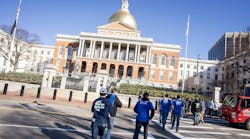 Attendees at the Massachusetts State Capitol building in Boston. Attendees at the Massachusetts State Capitol building in Boston.