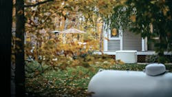 An outdoor propane tank. An outdoor propane tank.