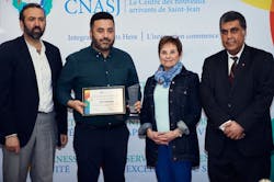 Fahad Khan, second from right, Plant Director of NTI Boilers, accepts the Outstanding Business Partnership Award from the Saint John Newcomer Centre. Presenting the award are Emin Civi, Chairperson of the Board at Saint John Newcomers Centre, left; Nancy Grant, Mayor of Rothesay, second from right; and Mohamed Bagha, Managing Director at Saint John Newcomers Centre. Fahad Khan, second from right, Plant Director of NTI Boilers, accepts the Outstanding Business Partnership Award from the Saint John Newcomer Centre. Presenting the award are Emin Civi, Chairperson of the Board at Saint John Newcomers Centre, left; Nancy Grant, Mayor of Rothesay, second from right; and Mohamed Bagha, Managing Director at Saint John Newcomers Centre.