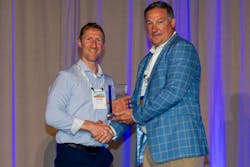 David Fink, PPI President (right), congratulates Andrew Nause of IPEX USA for being voted Member of the Year for the association’s Power & Communications Division. David Fink, PPI President (right), congratulates Andrew Nause of IPEX USA for being voted Member of the Year for the association’s Power & Communications Division.