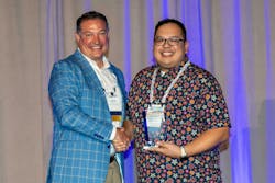 David Fink, PPI president (left) congratulates Daniel Pierce of Reliance Worldwide for being named Member of the Year for the association’s Building & Construction Division. David Fink, PPI president (left) congratulates Daniel Pierce of Reliance Worldwide for being named Member of the Year for the association’s Building & Construction Division.