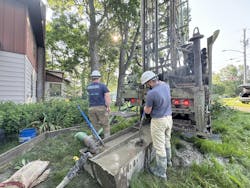 Along with a new well, project partners worked to build a wooden access ramp for Megan. They also provided other services, such as yard cleanup and installing a basketball hoop. Along with a new well, project partners worked to build a wooden access ramp for Megan. They also provided other services, such as yard cleanup and installing a basketball hoop.