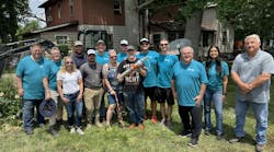 Volunteers from the Water Well Trust (WWT) and HometownH2O along with members of the Olsen family. Volunteers from the Water Well Trust (WWT) and HometownH2O along with members of the Olsen family.