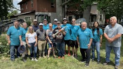 Volunteers from the Water Well Trust (WWT) and HometownH2O along with members of the Olsen family. Volunteers from the Water Well Trust (WWT) and HometownH2O along with members of the Olsen family.