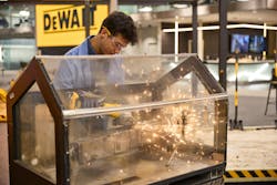 A student gets hands-on in the DEWALT Experience and Innovation Center. A student gets hands-on in the DEWALT Experience and Innovation Center.