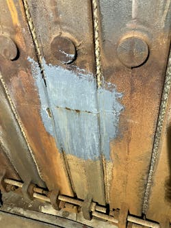 A 3 million btu commercial cast iron boiler with its sheet metal jacket removed. This horizontal crack across the section is about halfway up. A 3 million btu commercial cast iron boiler with its sheet metal jacket removed. This horizontal crack across the section is about halfway up.