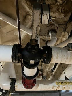 The boiler loop pump and the three-way valve. The boiler loop pump and the three-way valve.