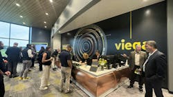Guests check in at the lobby for the ribbon cutting ceremony of Viega's $178 million new manufacturing and training facility. Guests check in at the lobby for the ribbon cutting ceremony of Viega's $178 million new manufacturing and training facility.
