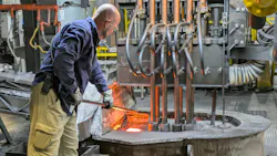 Working with molten copper at the NIBCO plant in Stuarts Draft, VA. Working with molten copper at the NIBCO plant in Stuarts Draft, VA.