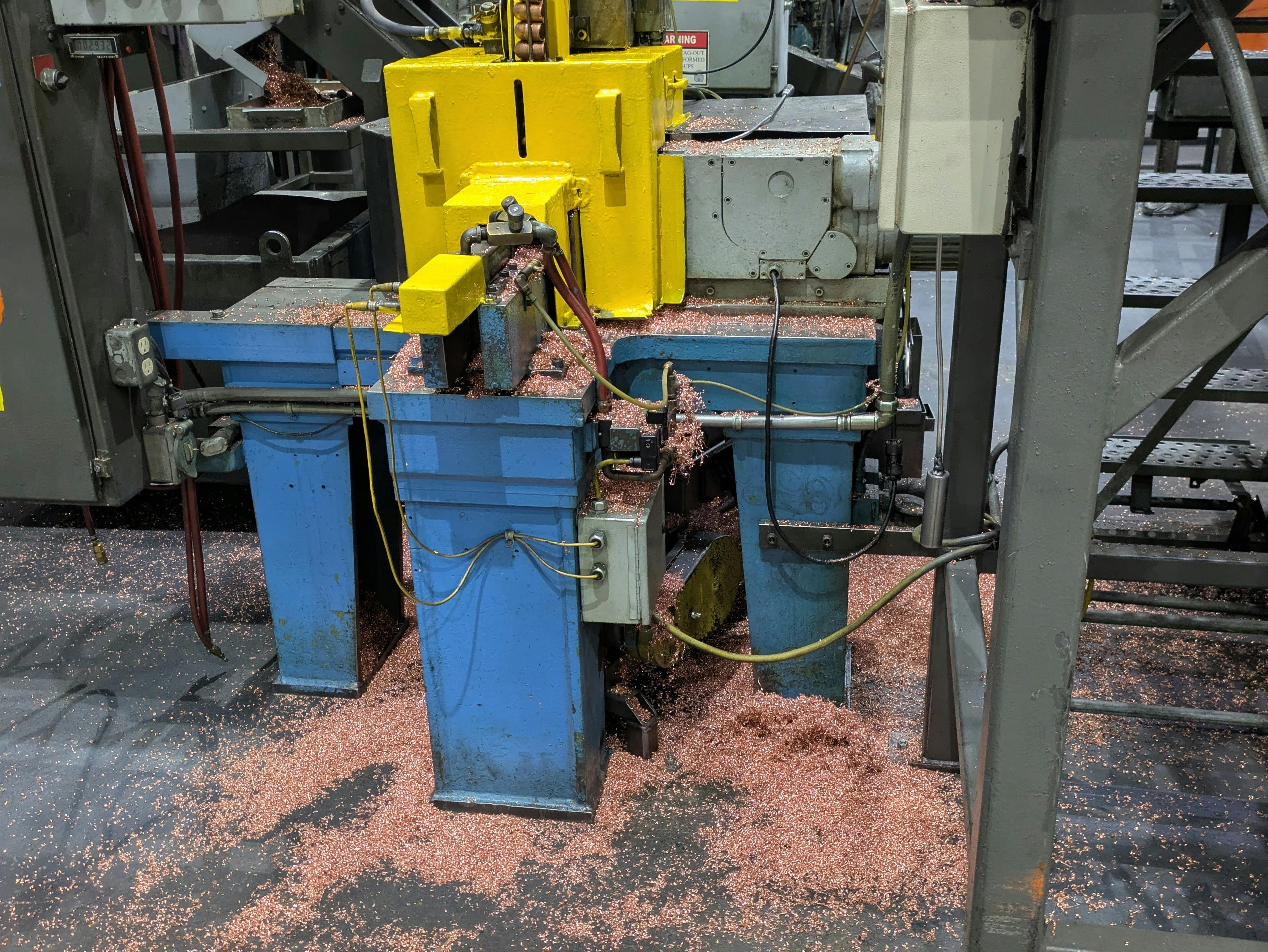 Recycling is a key component of the manufacturing process. All these copper shavings will be vacuumed up and re-melted.