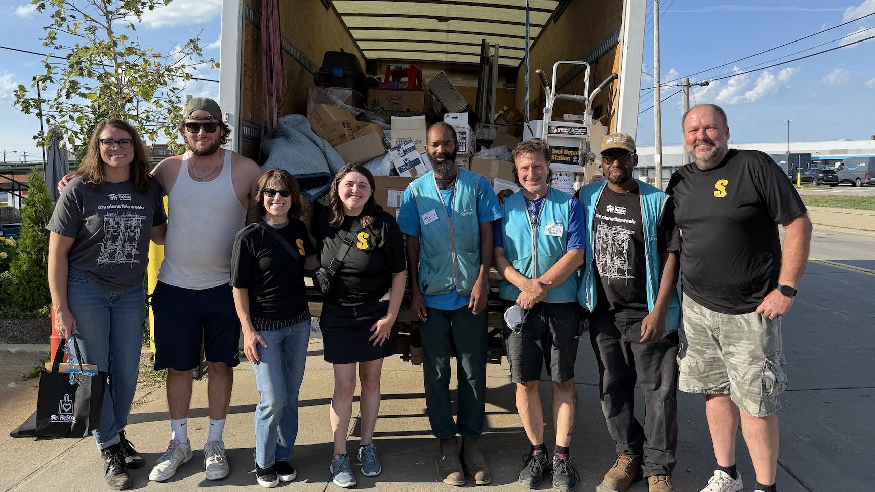 Members of the Sonnhalter team with Habitat for Humanity volunteers.