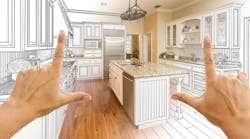 Female Hands Framing Gradated Custom Kitchen Design Drawing and Photo Combination. Female Hands Framing Gradated Custom Kitchen Design Drawing and Photo Combination.