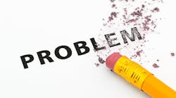 eraser erasing the word 'problem' eraser erasing the word 'problem'