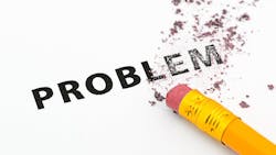 eraser erasing the word 'problem' eraser erasing the word 'problem'