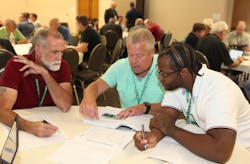 Conference attendees participate in a Uniform Mechanical Code (UMC®) workshop Sept. 17. Conference attendees participate in a Uniform Mechanical Code (UMC®) workshop Sept. 17.