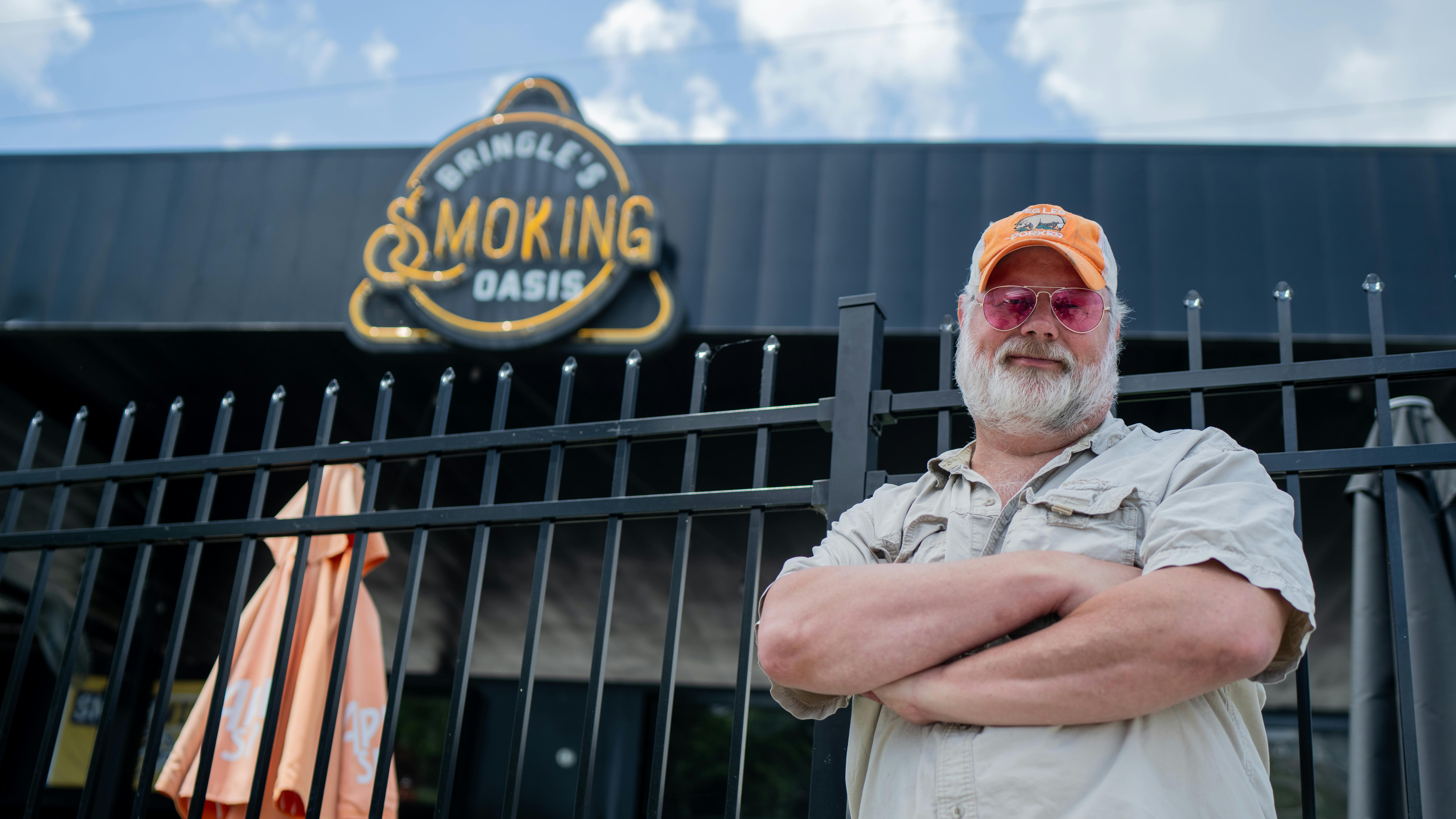 Carey Bringle in front of the Smoking Oasis.
