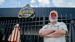 Carey Bringle in front of the Smoking Oasis. Carey Bringle in front of the Smoking Oasis.
