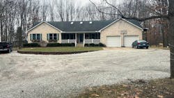 An exterior view of the home. Both driveway and sidewalk feature a snowmelt system. An exterior view of the home. Both driveway and sidewalk feature a snowmelt system.