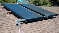 Rooftop mounted solar water heating system. Rooftop mounted solar water heating system.